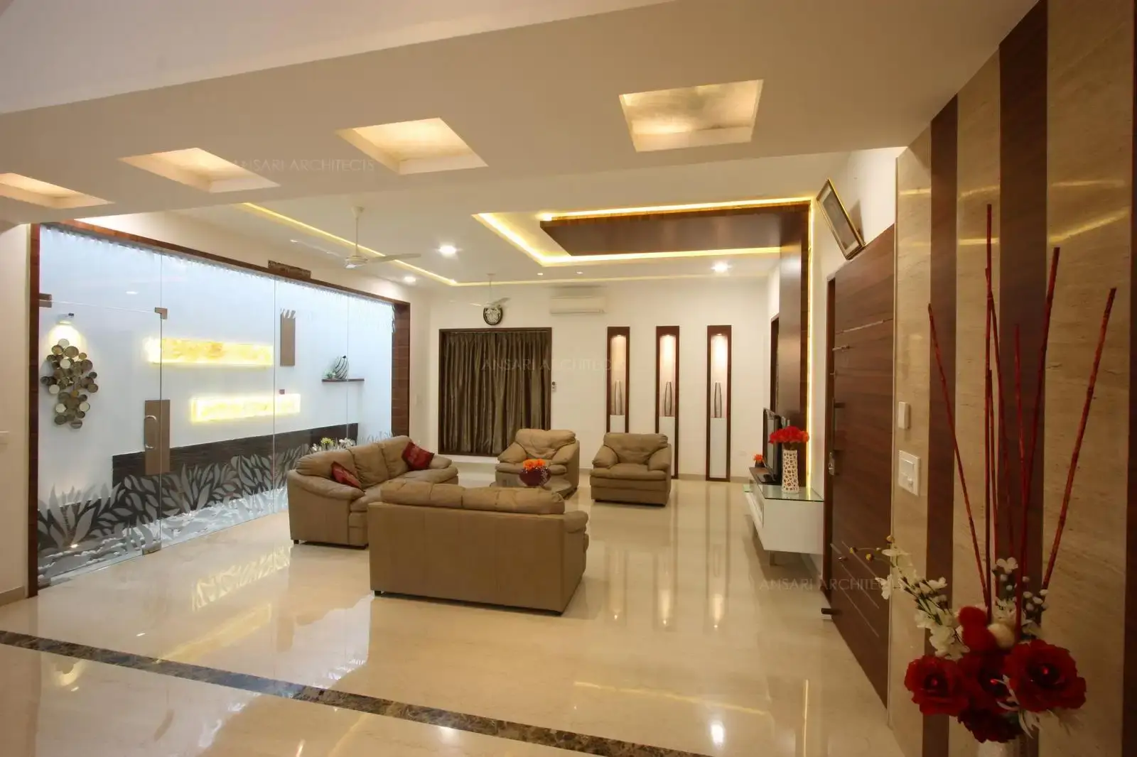 Contemporary flair and muted aesthetics to a variety of textures, patterns and finishes. Modish, subtle with veneer panelling and the cool furniture scheme. The recessed downlights and array of rectangular cove lights and soft functional tones of this space blend together perfectly for ambient lighting.