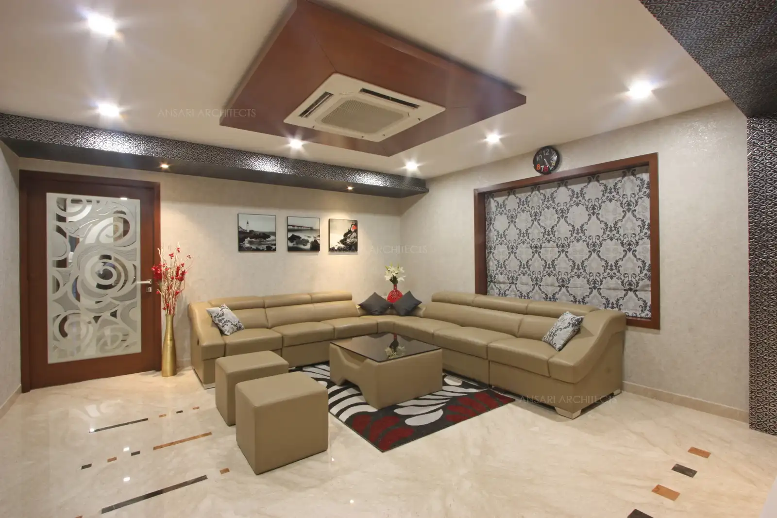 Here, furniture becomes more integral with a colorful throw cushion to complete the look with two identical seaters and a console table integrating with the seaters