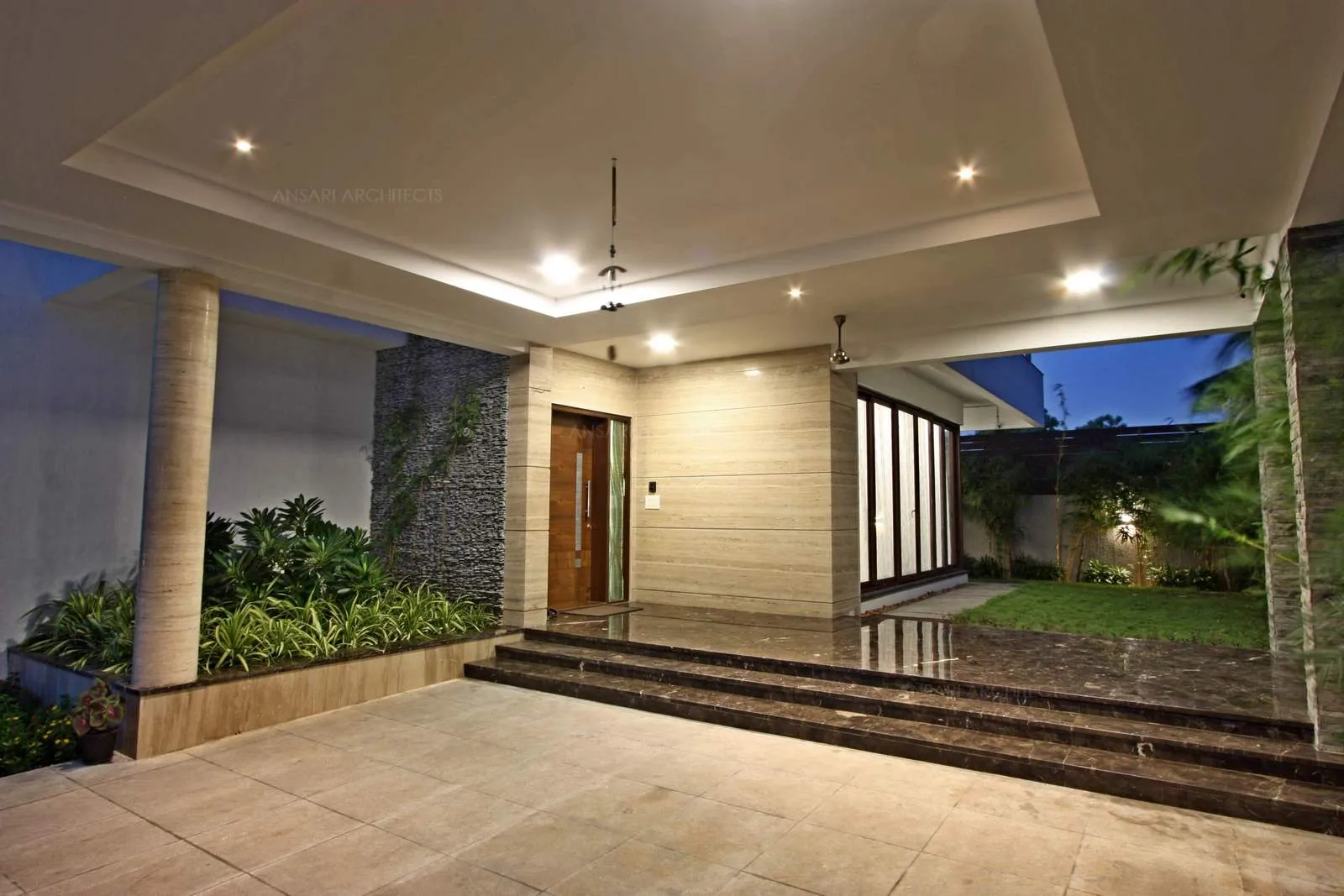 The entry verandah area is clad with marble and the landscapes integrate greatly, recessed ceiling lights provide in a subtle glow of the space.