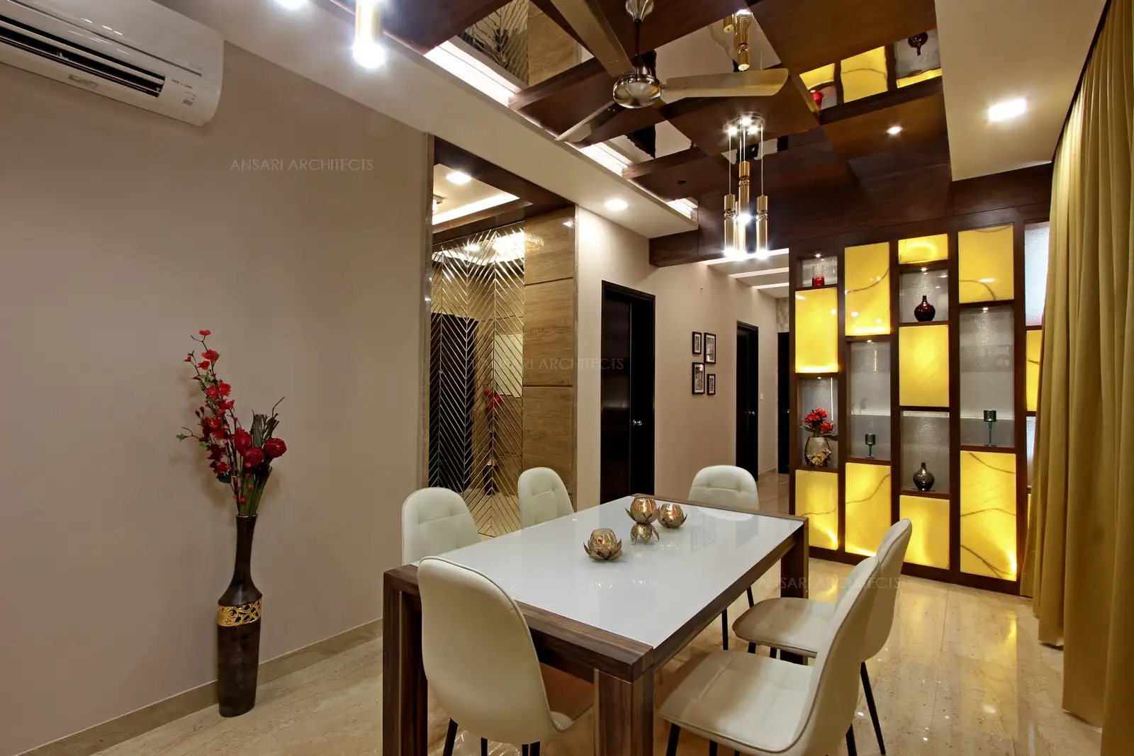 The interplay between wood and white walls, the unique mettalic strings of lights counterbalance the ceiling looks eclectic grid-like mirror patterned veneer ceiling, mirror reflects the glow of lights and provides more contemporary effect.