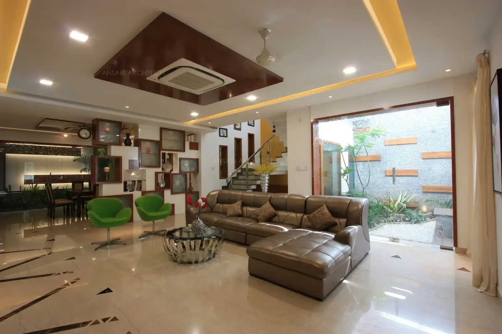 Living room in the front is bright and spacious with natural lights falling from the well planned courtyard.