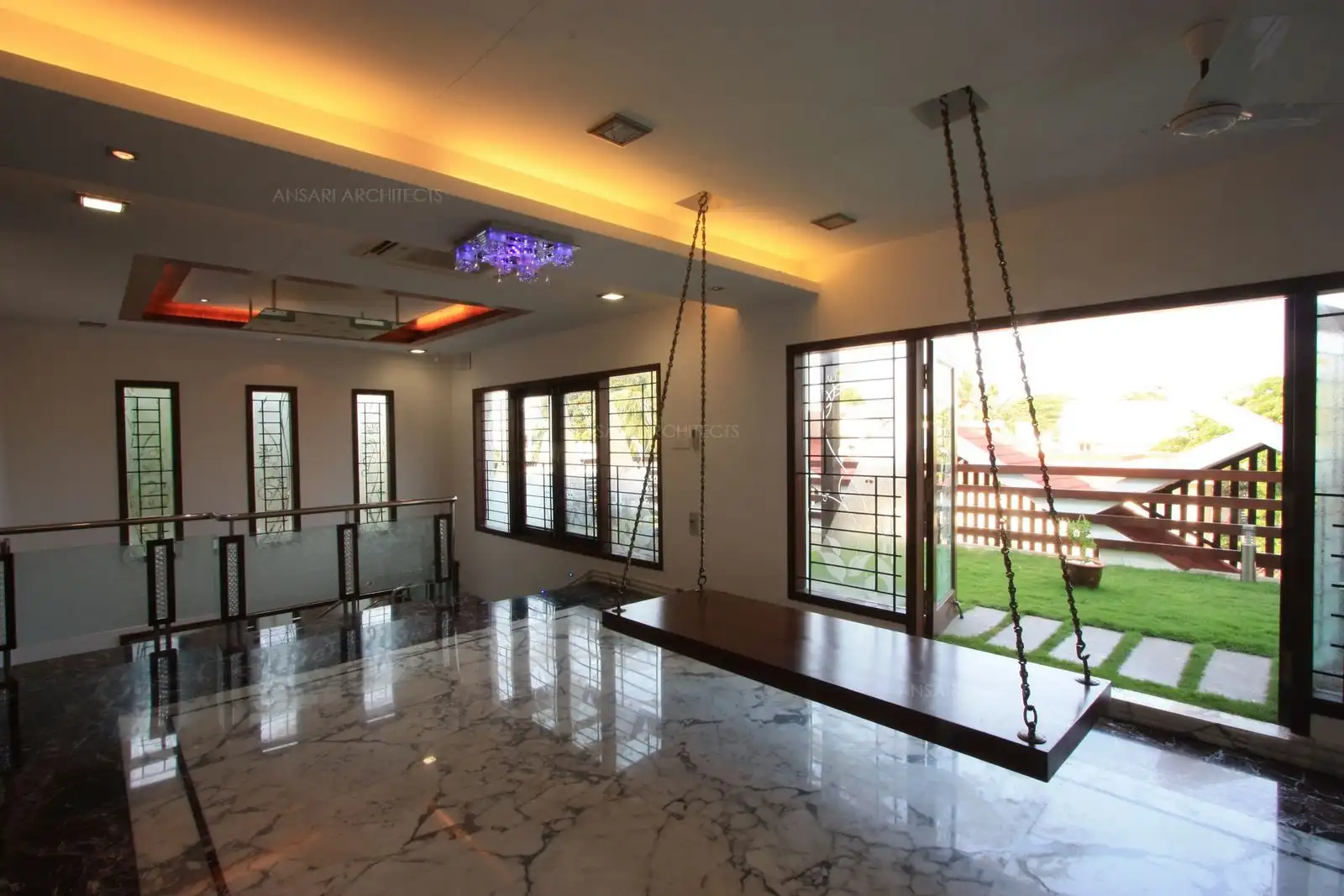 View of second floor showing the swing facing the terrace garden.