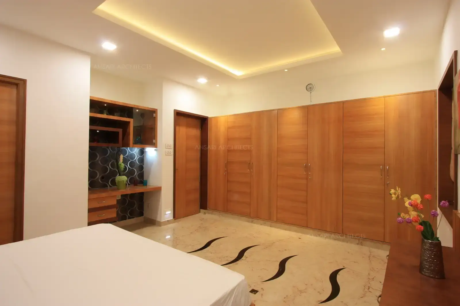 View of bedroom 5 showing the full length wardrobe and study table.