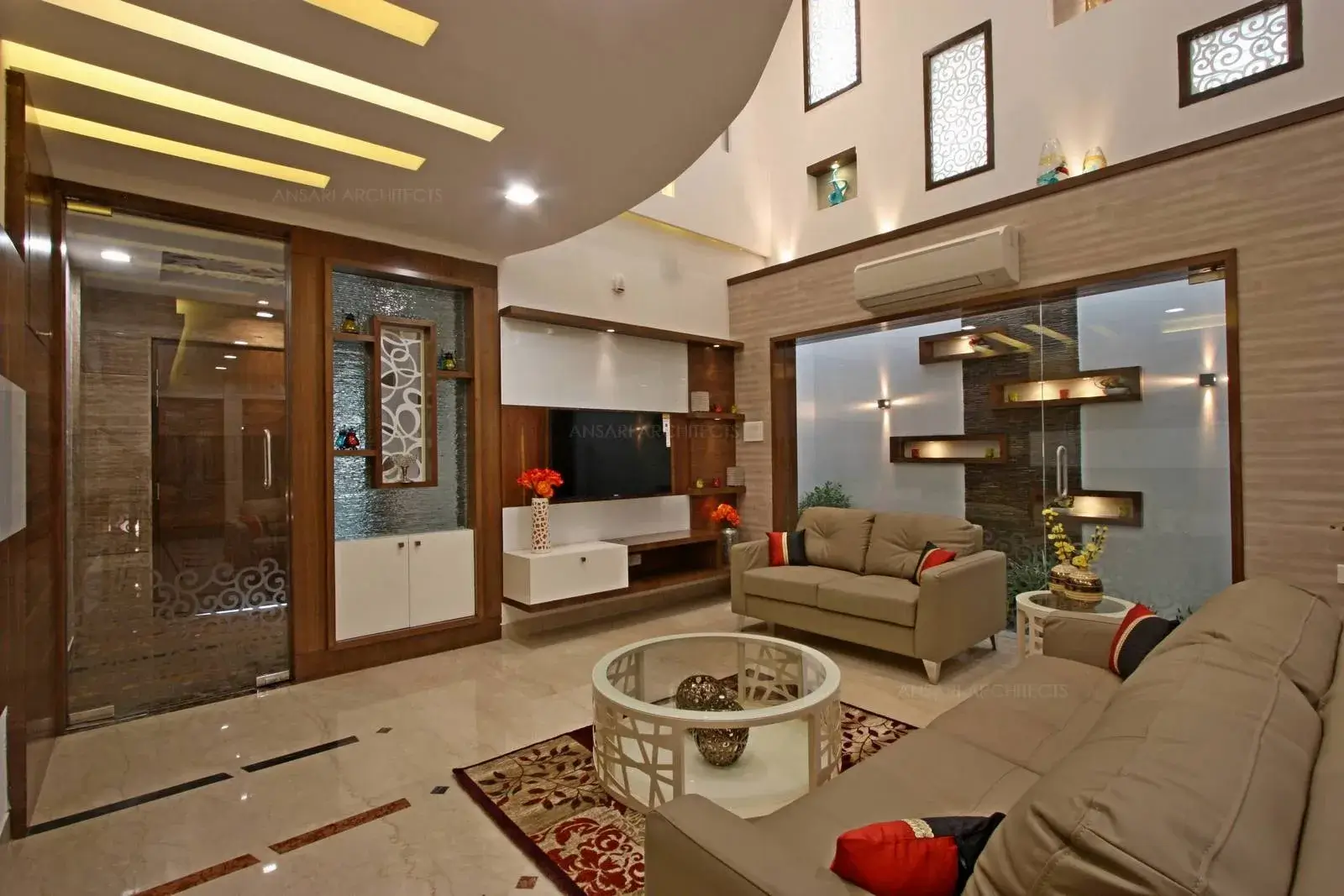 Ceiling lights and wooden furnishings brighten the space.