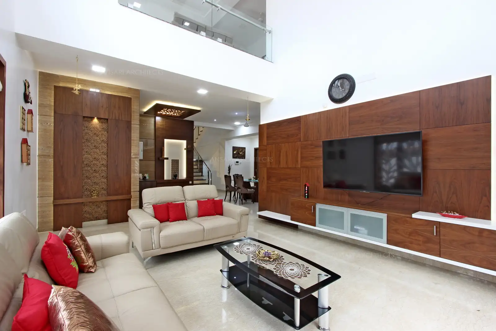 Antique finish with clean, contemporary unit complements the monotone scheme of the room. Floating TV unit makes space. The closed cabinets helps create a visually pleasing look.