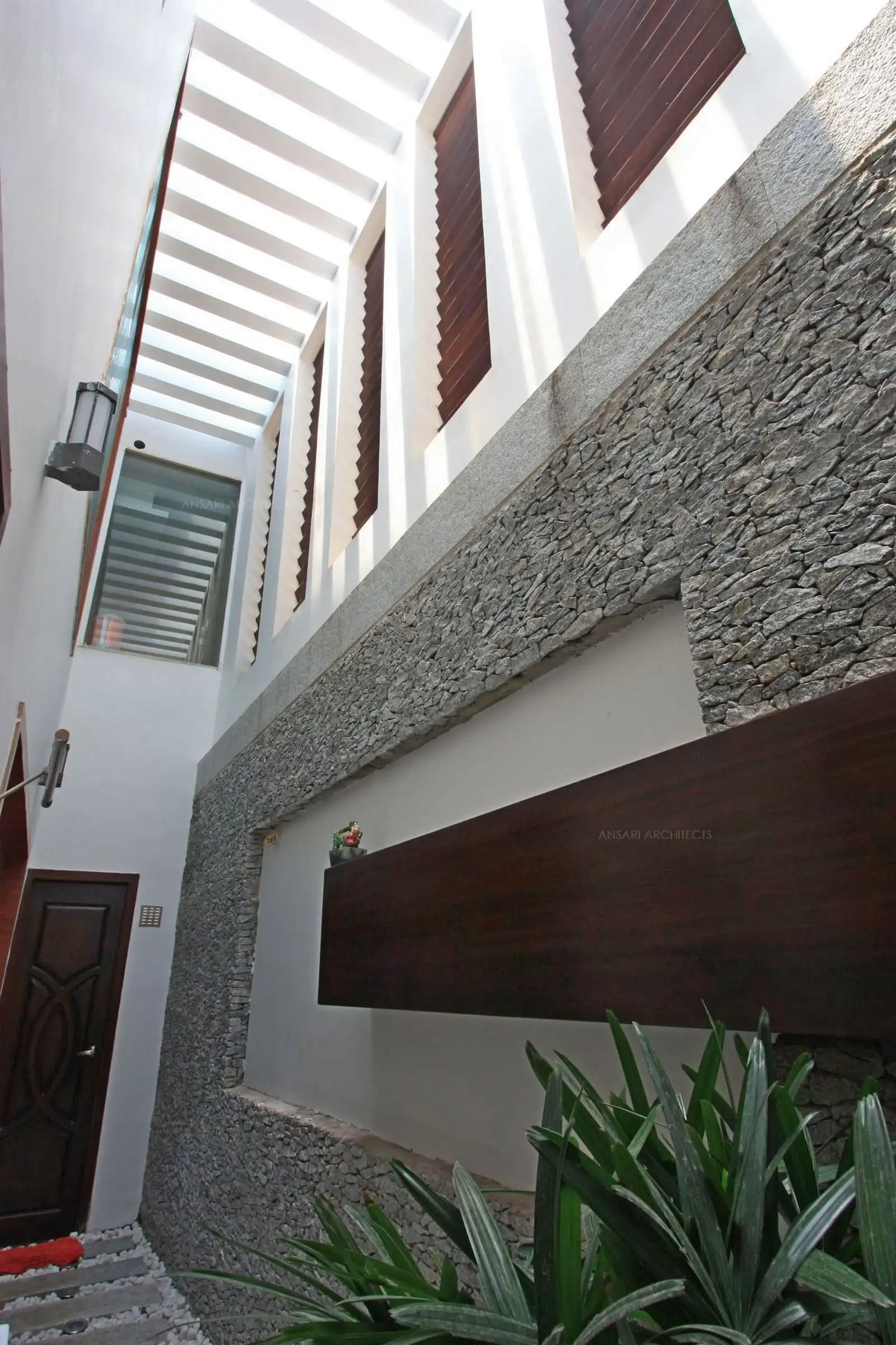 View of courtyard which extends up to first floor.