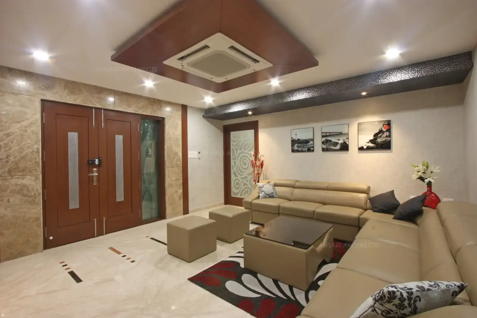 Lights are used as decorative elements, the wallpaper effect is subtle yet significant and accentuates architectural details of the room and elaborate.