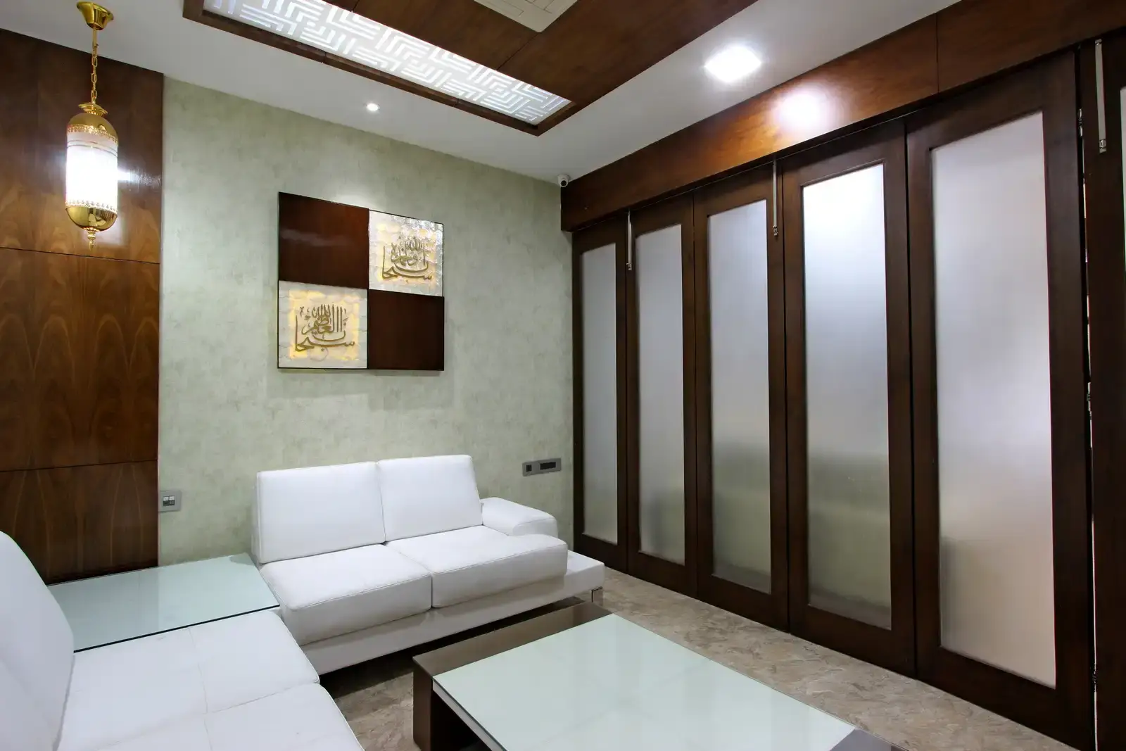 The islamic inscriptions printed on the wall add a depth to the art.