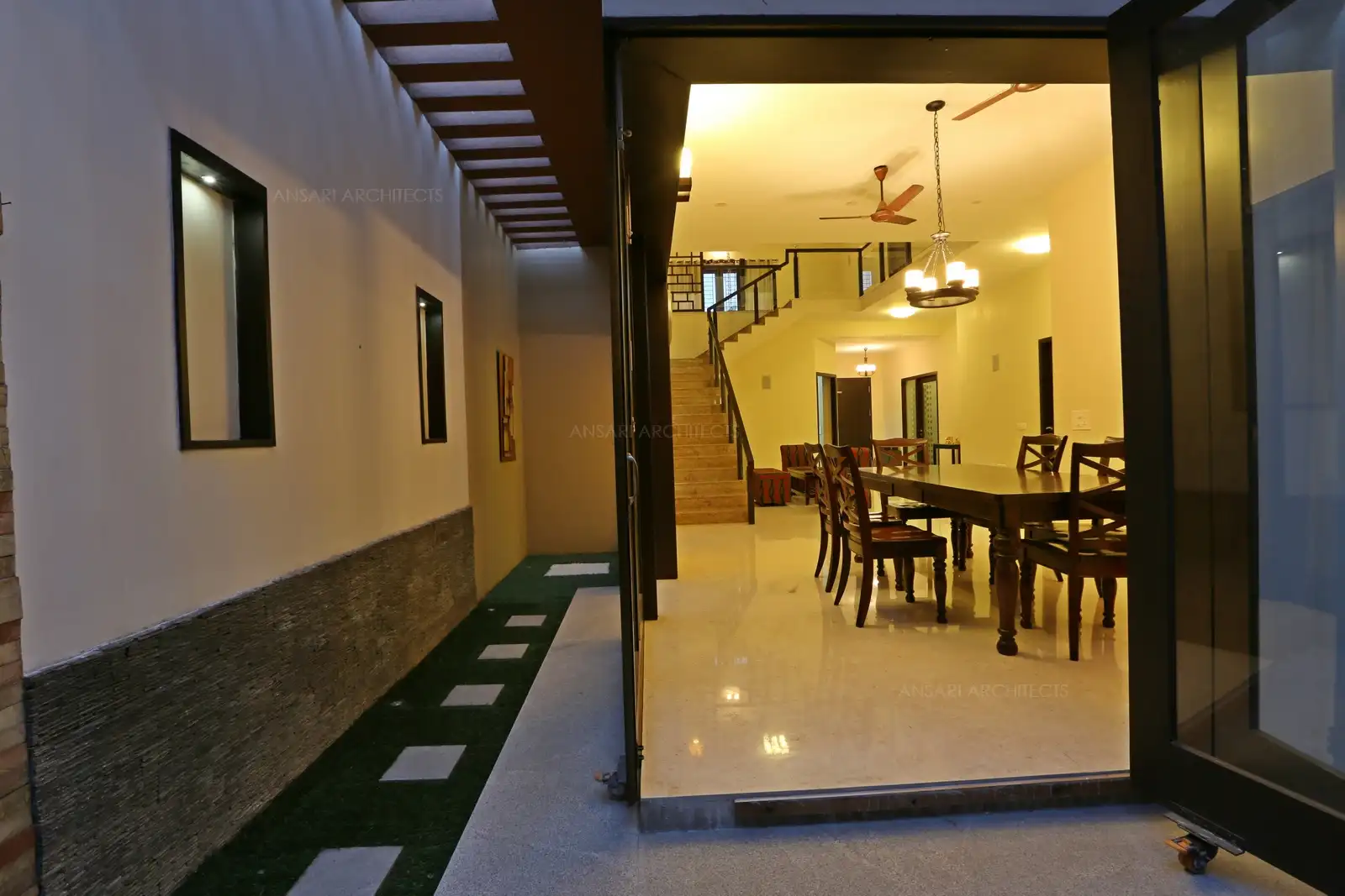 View of living and dining room from the courtyard.