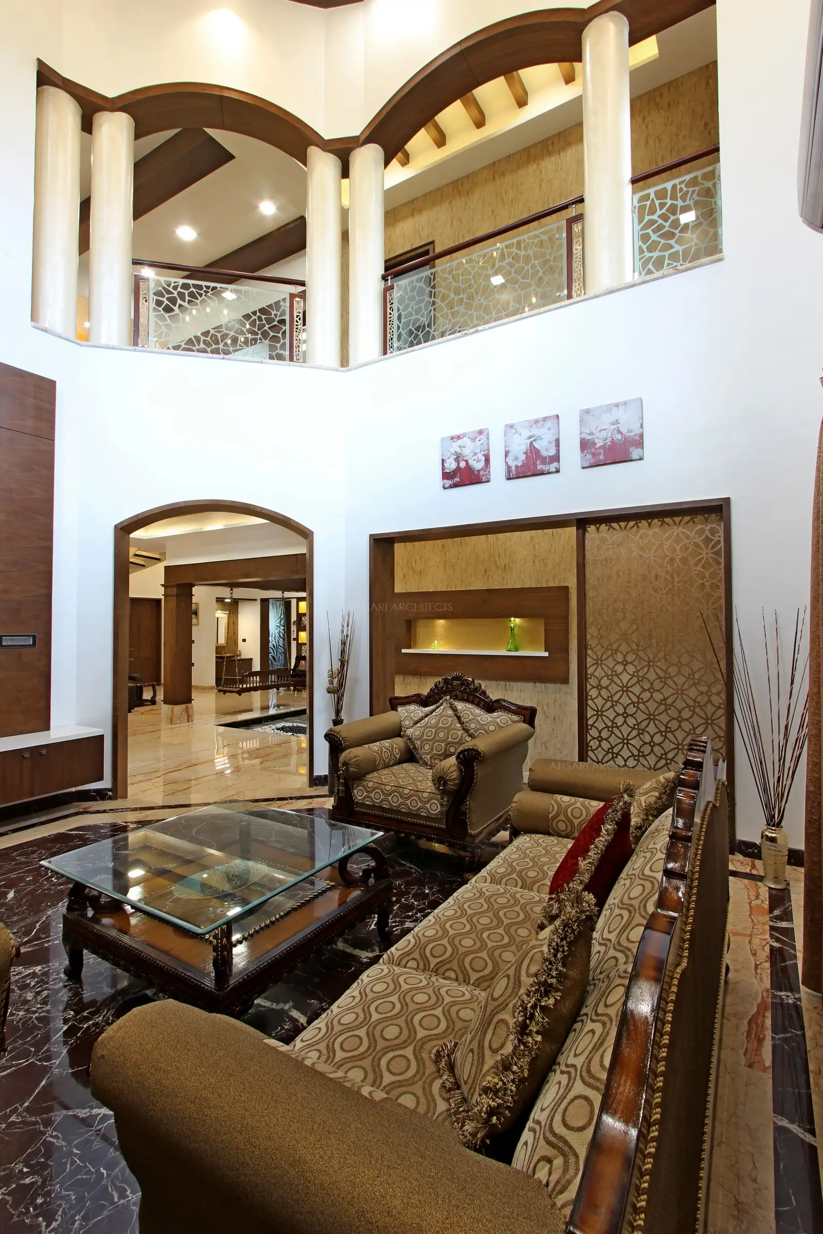 The living space is contemporary with some royal elements along with interesting furnitures and materials.