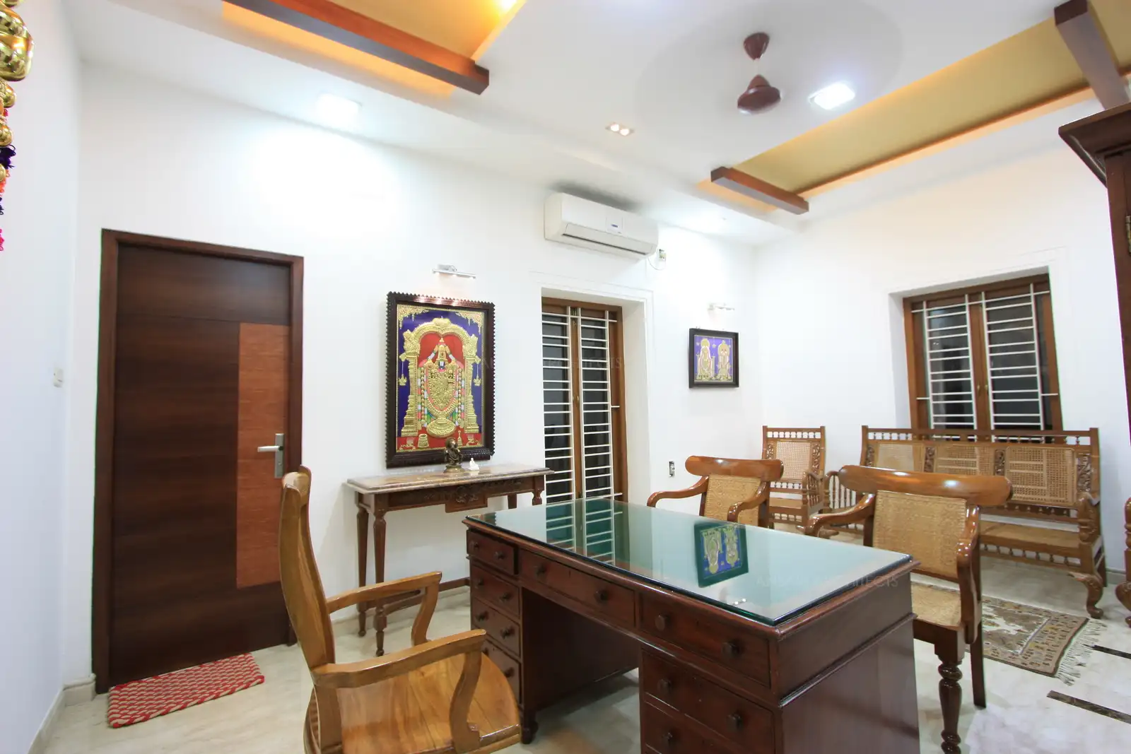 The office room used by the owner of the house to meet the visitors exudes the furniture style erstwhile South India. Most of the furniture are retained from the original house itself.