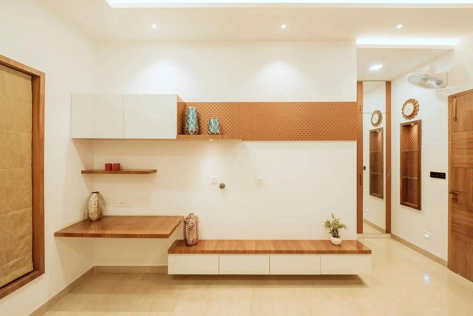 The area is designed as a multifunctional wall niche, likely serving as a study, work, or entertainment zone within a bedroom.