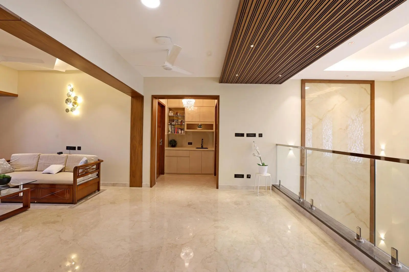 The pantry sits beside the living area with a framed entry for subtle separation. Its compact layout supports smooth circulation and everyday functionality.