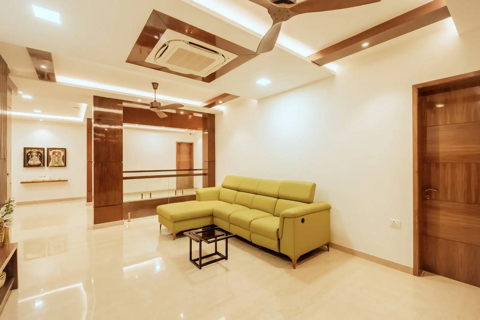 The open layout allows for easy movement between rooms and the staircase, making it ideal for family interaction.