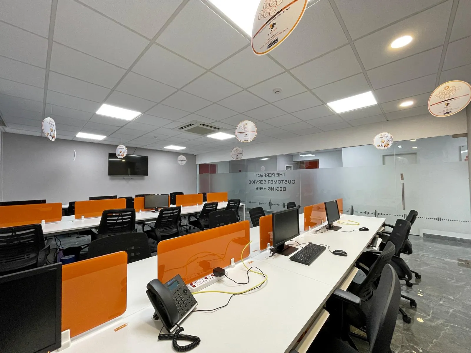 Designed for efficiency and comfort, the 26-seat office features ergonomic seating, vibrant partition panels, and neutral walls to enhance spatial brightness. Integrated air-conditioning, polished flooring, and thoughtful cable management maintain a clean, functional, and visually cohesive environment.