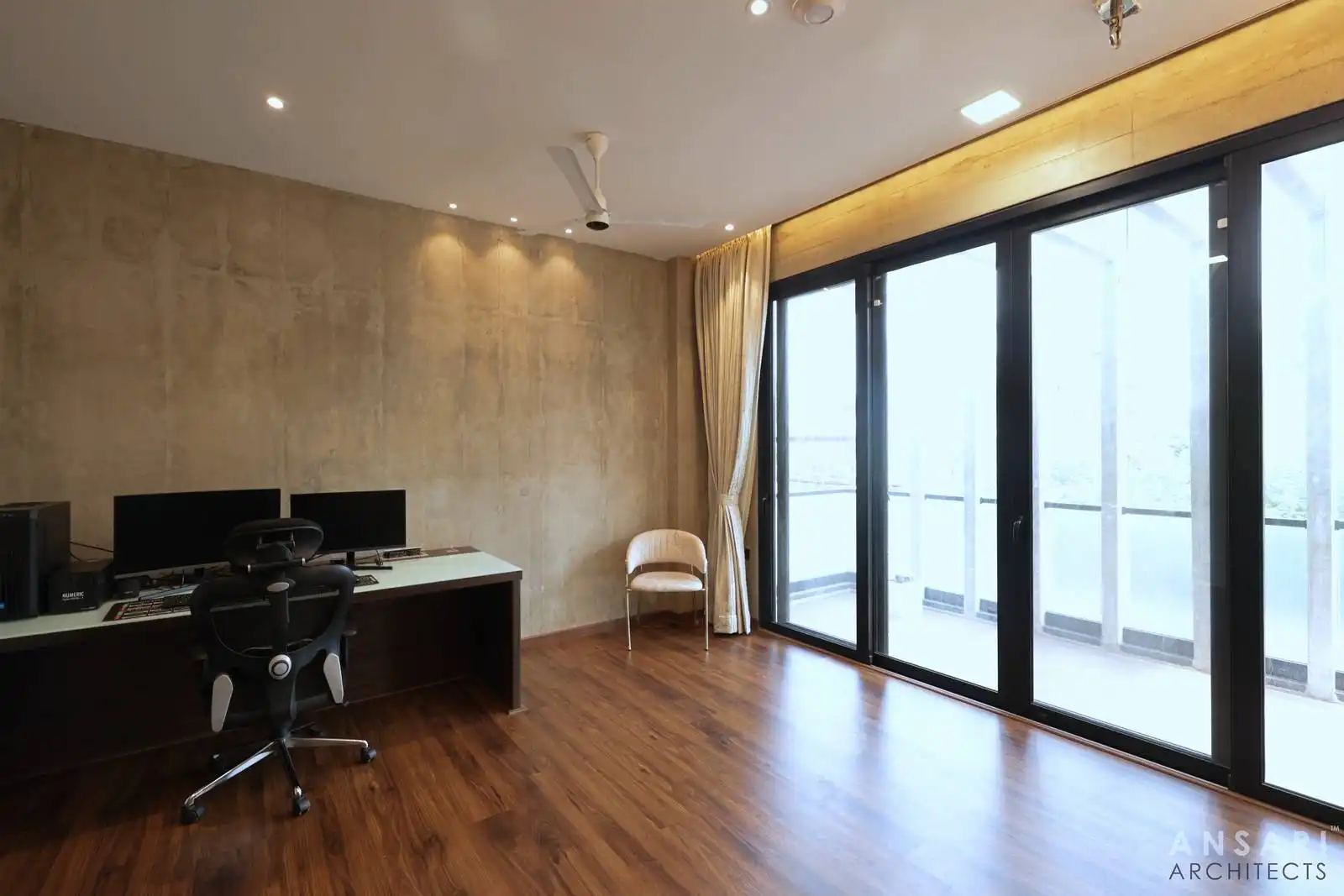 Polished wooden flooring lends a refined, cohesive look to the workspace, combining visual warmth with lasting durability.