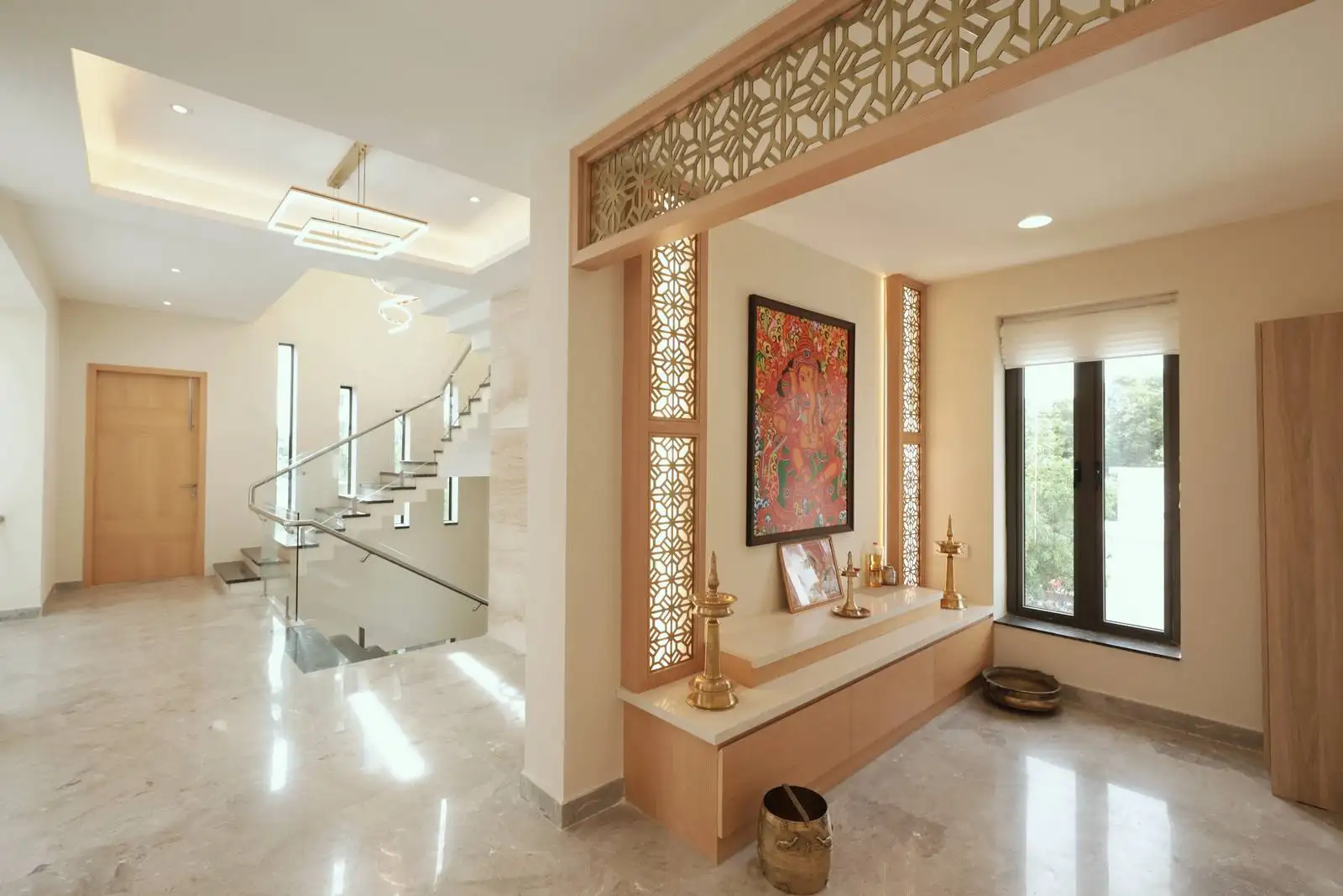The open design and proximity to windows in the adjacent space ensure good ventilation and natural light during the day.
