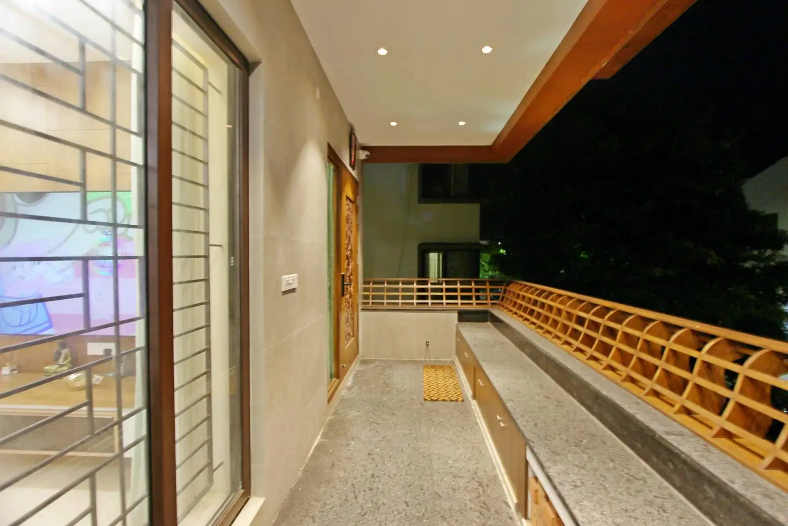 Use decorative wooden railings to provide safety while enhancing the visual appeal and allowing airflow.
