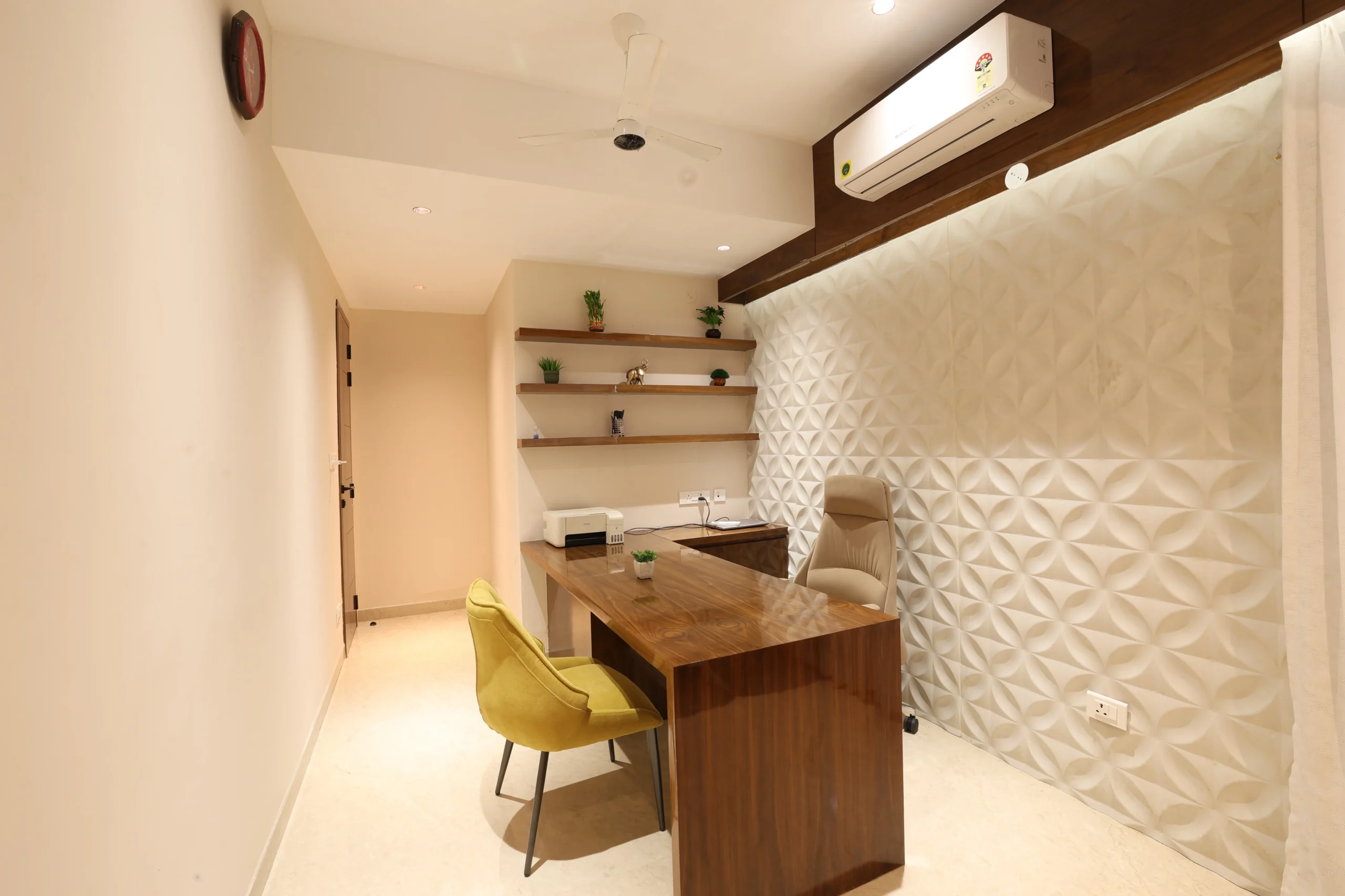 Stylish workspace showcasing a polished wooden desk, ergonomic chairs, warm neutral palette, and soft ambient lighting, fostering a comfortable, functional, and aesthetically balanced environment.




